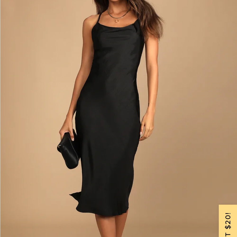 Black silk lulus dress, never worn, slightly torn on the slit about half an inch